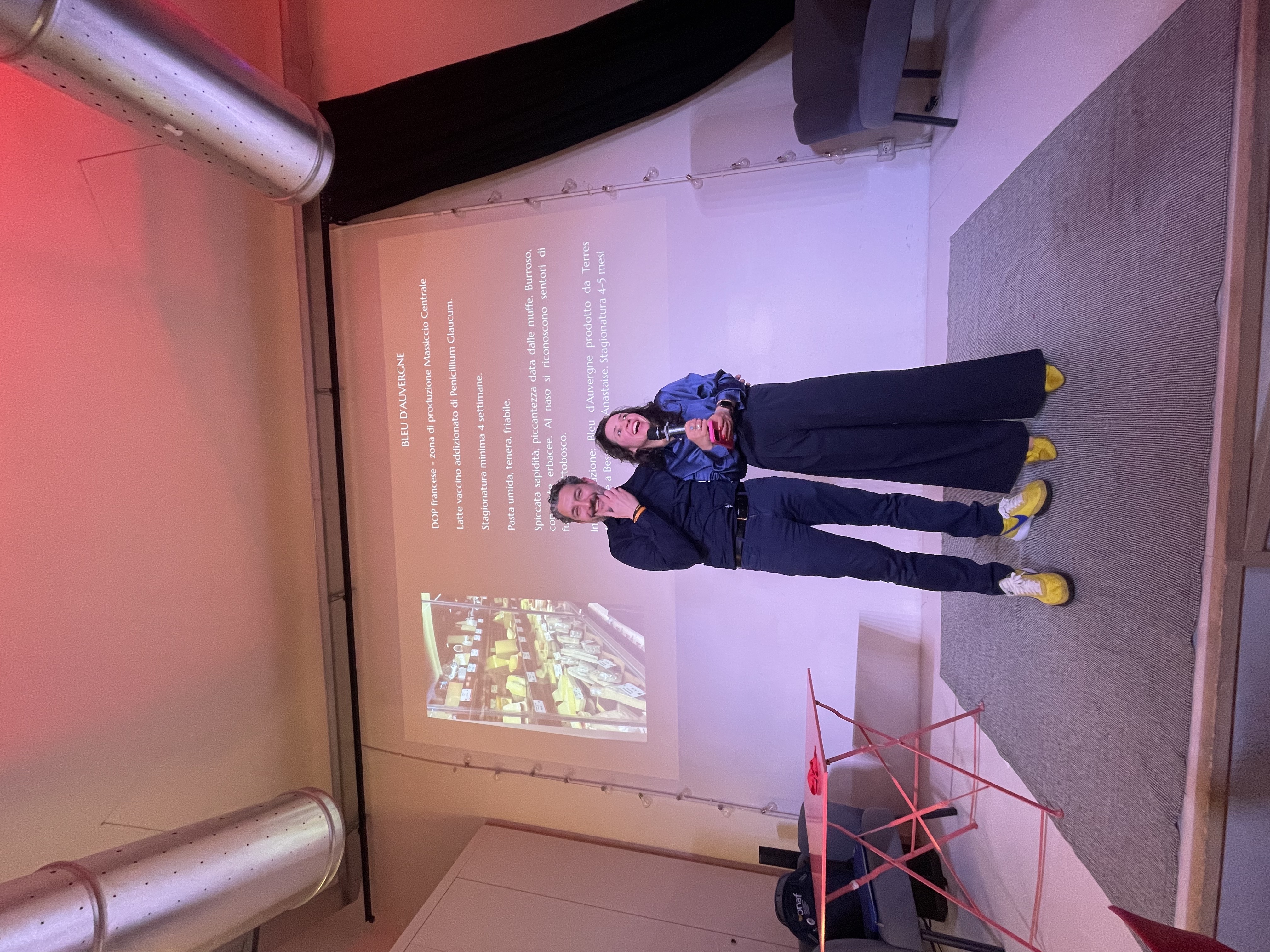 Stefano Moraschini e Chiara Carolei sul palco dell'evento da HUG, a Milano